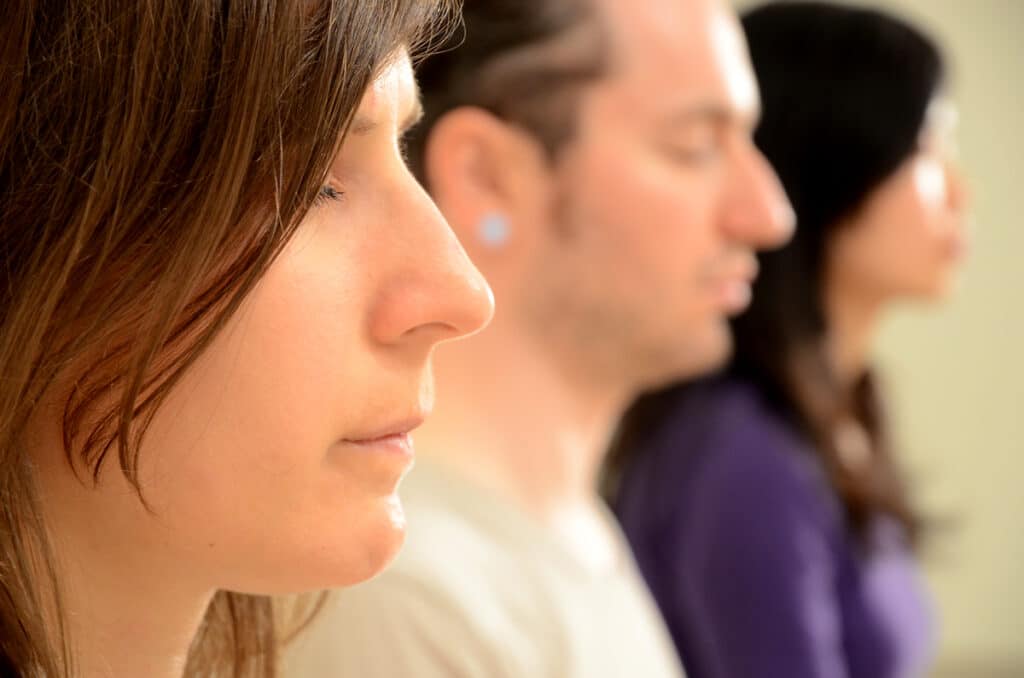 Meditation during yoga class.