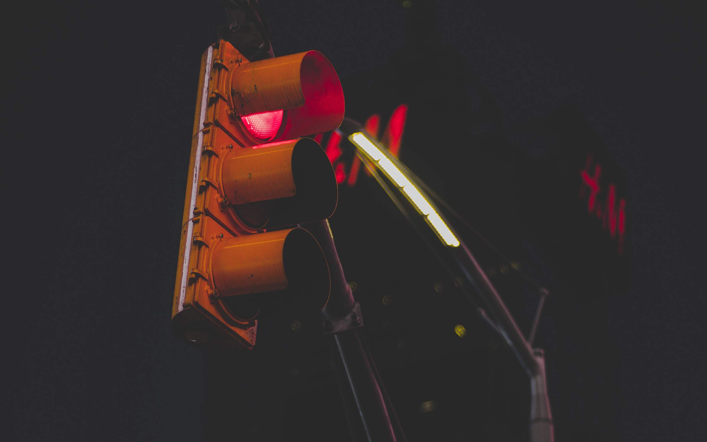 Red traffic light - symbol of slowing down to rest.