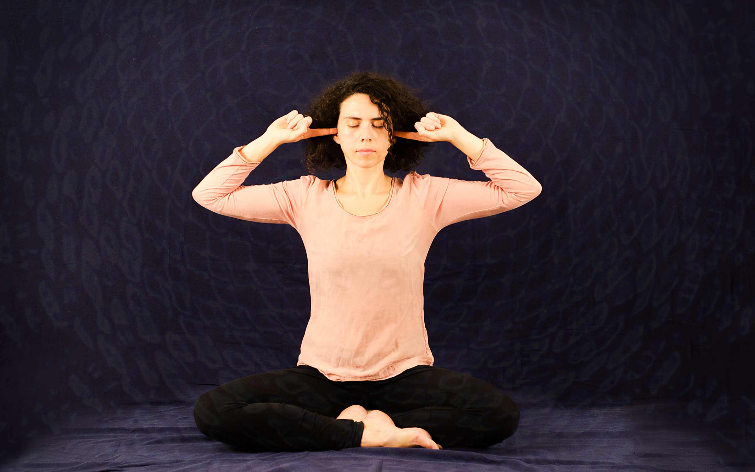 Bhramari Pranayama, a practice that has a calming effect on the mind and  body. 