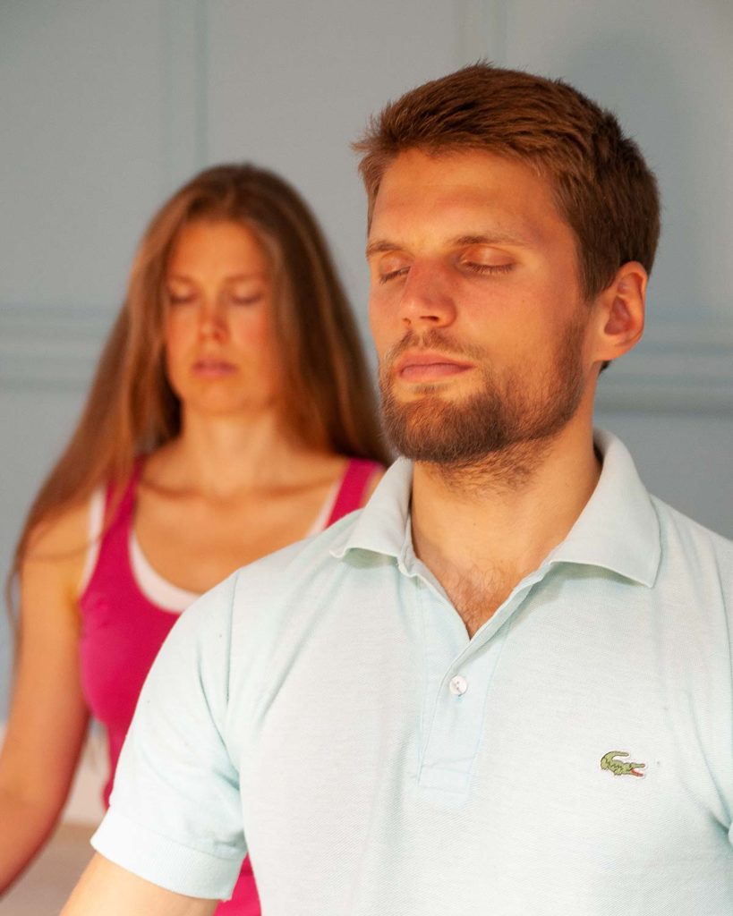 Yoga students in meditation.