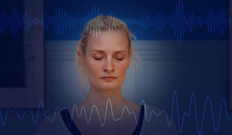 Meditating person with brainwaves