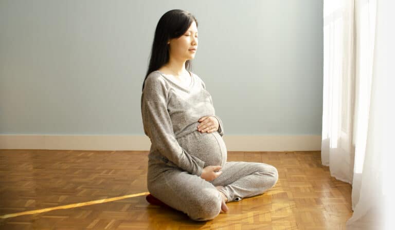 Pregnant woman meditating
